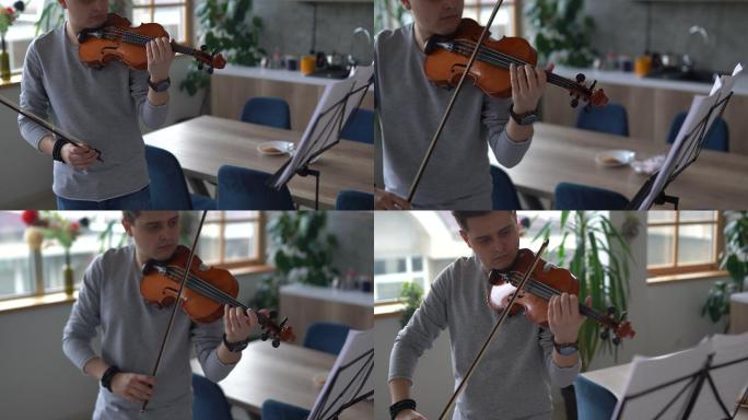 专业男小提琴家排练乐曲