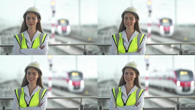 火车站双臂交叉的女工程师肖像