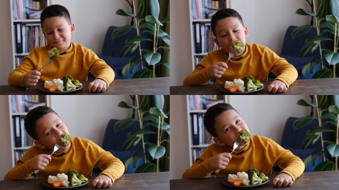 喜欢吃蔬菜的孩子。他的盘子里有很多蔬菜。他喜欢蔬菜。