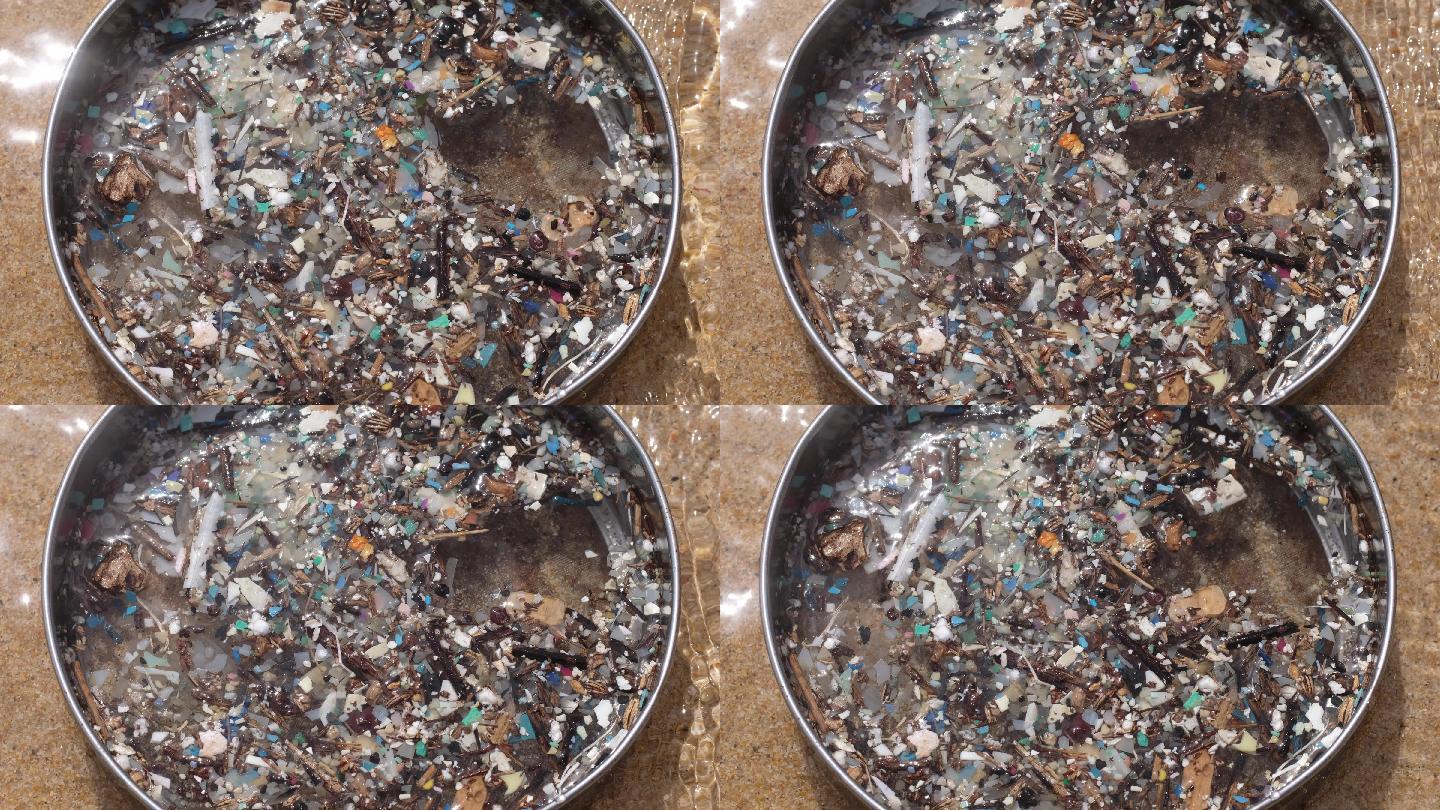 漂浮在海水中的小塑料碎片，也称微塑料污染。