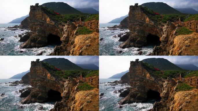 实拍海边海边礁石山洞