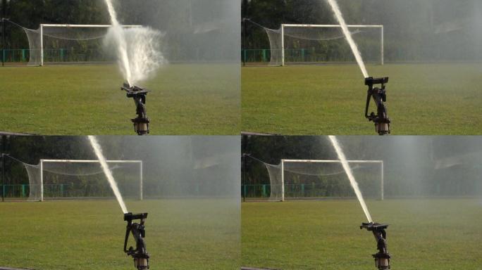 足球场上的喷水装置慢动作