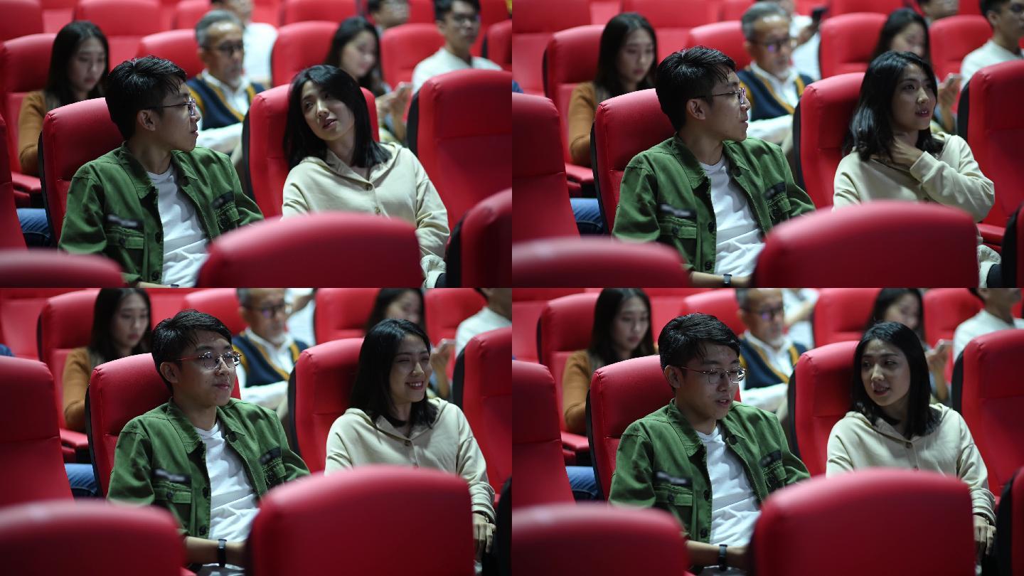 亚裔中国年轻夫妇在电影院结缘时，一边等待电影放映，一边享受彼此的陪伴