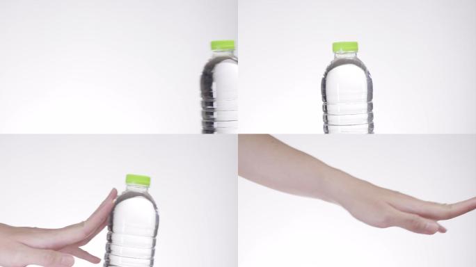 推回废弃塑料瓶拒绝瓶装水