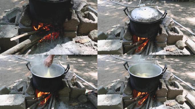 深山野外户外烧柴火做饭美食野炊煮鸡白斩鸡