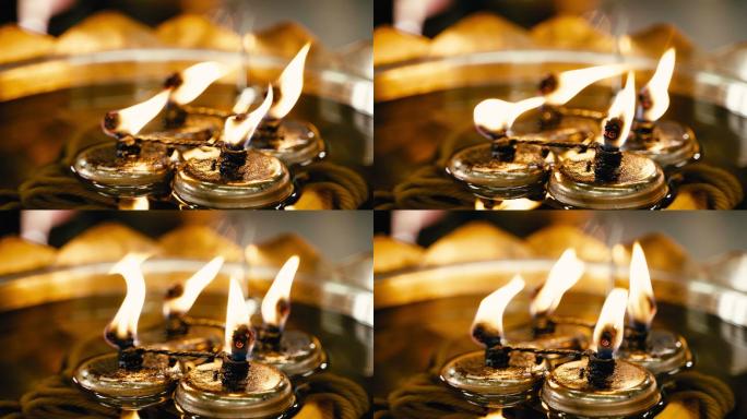 圣殿里燃烧的油烛灯发出的火焰。