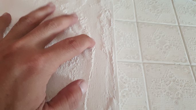 漏水损坏墙壁装修材料白墙墙皮