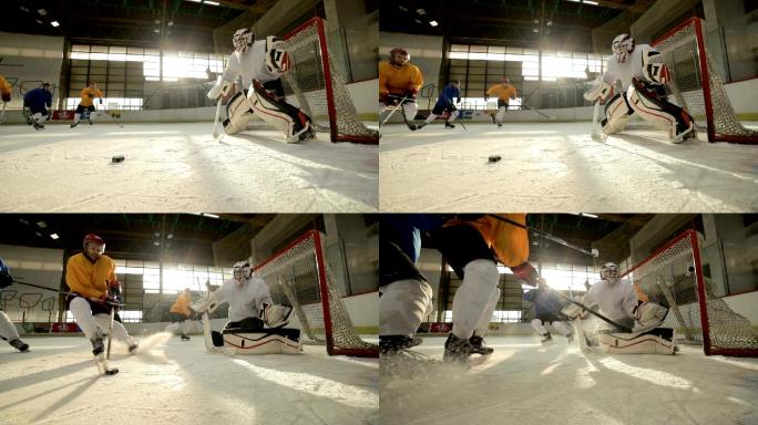 冰球运动员在溜冰场比赛中动作缓慢。