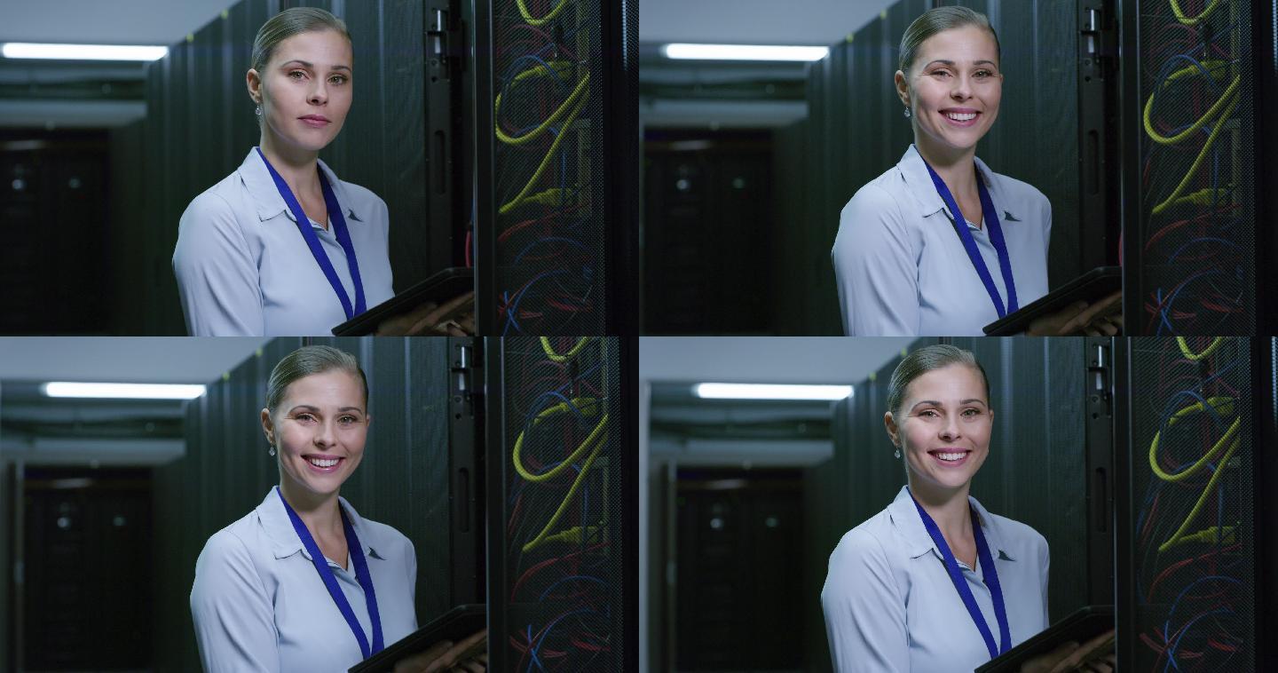 一名年轻女子在服务器机房工作时使用数字平板电脑的4k视频片段