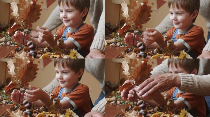 秋天，小男孩和他的父亲在家里做手工艺品