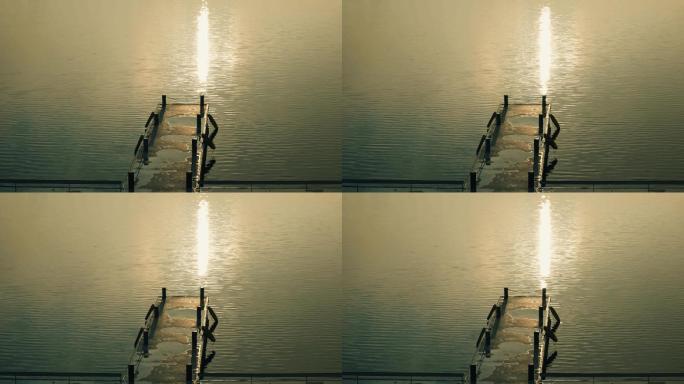 清晨黄昏湖边逆光码头波光粼粼视频素材