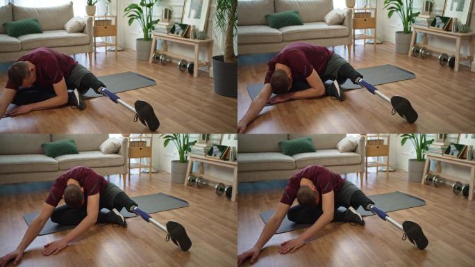 年轻男子在家开始锻炼前进行假腿伸展