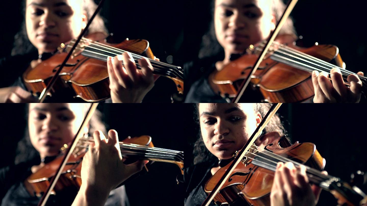 混血少女拉小提琴小提琴考试