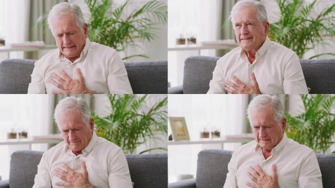 一名老年男子坐在家中沙发上时胸痛的4k视频片段