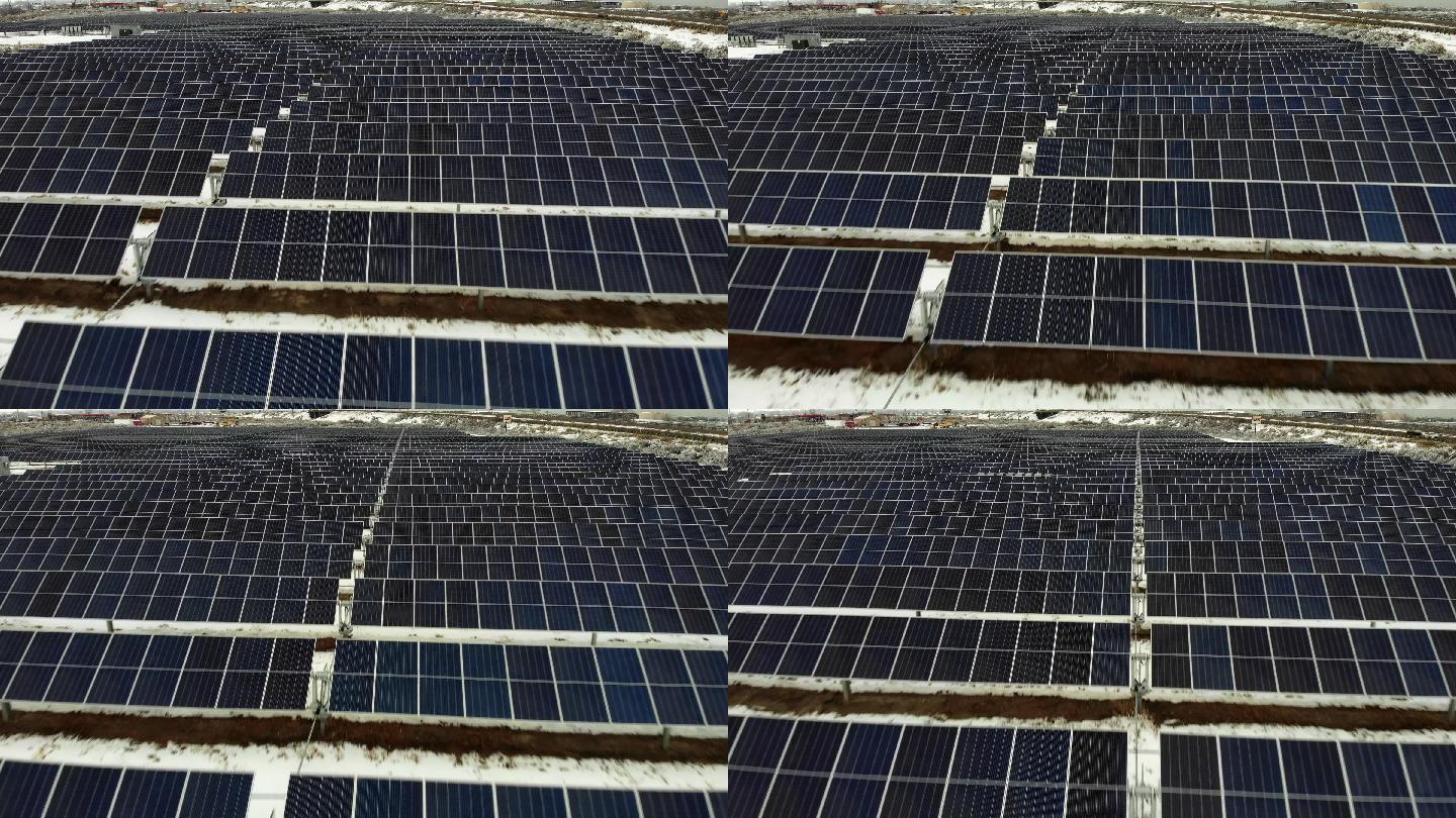 无人机拍摄的一个太阳能电池板农场在冬天没有阳光照射的农村地区
