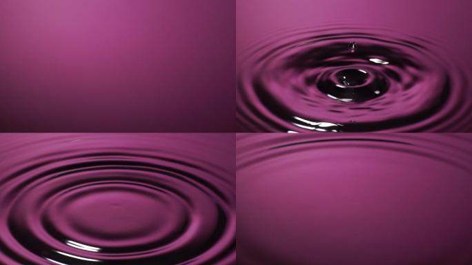 慢动作：水滴变成粉红色的水。