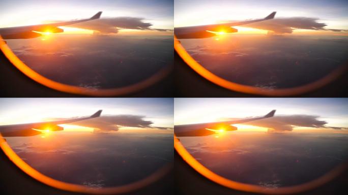 透过飞机的窗户，观看壮观的河流、蘑菇云和日落