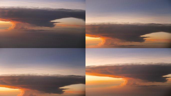 透过飞机的窗户看壮观的蘑菇云