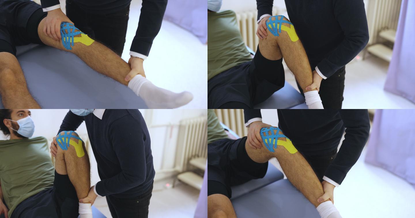 匿名物理治疗师在运动员膝盖上进行运动能力训练
