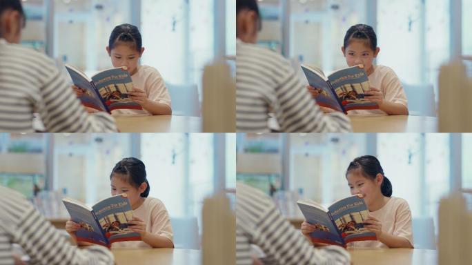 女士年轻女孩在看书