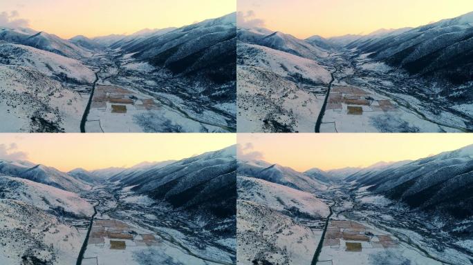 四川甘孜州雪山下的村庄航拍空镜头
