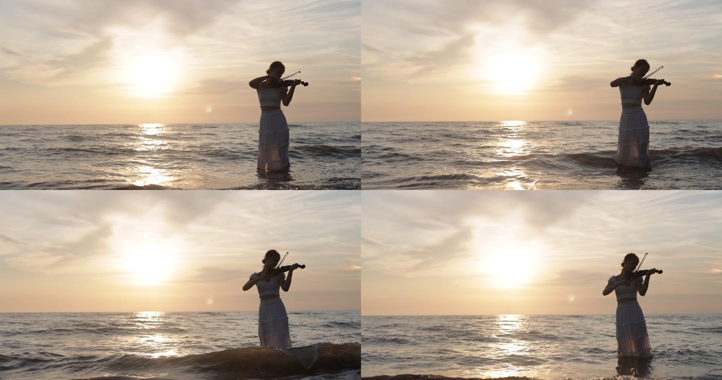 日落时在海滩上拉小提琴的少女