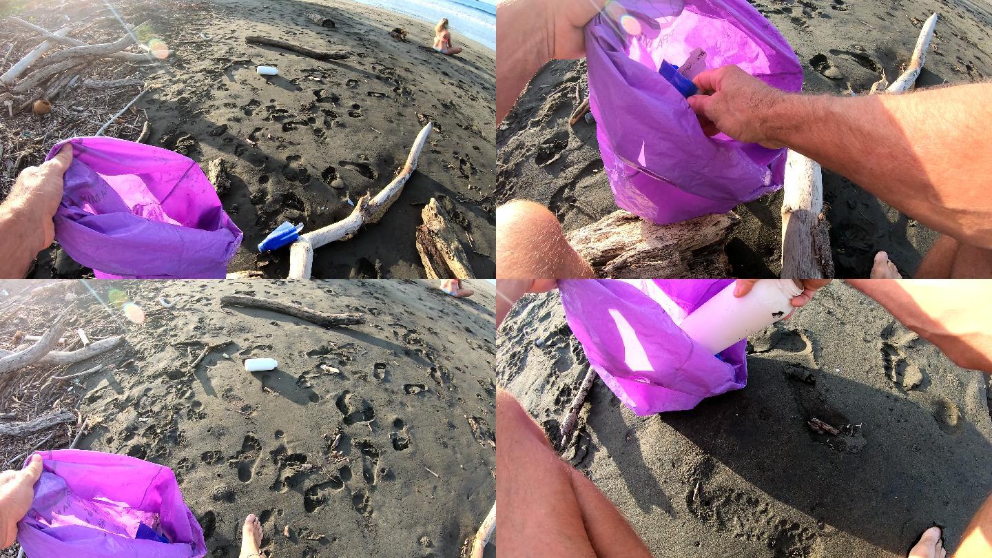 男子从海滩收集塑料垃圾