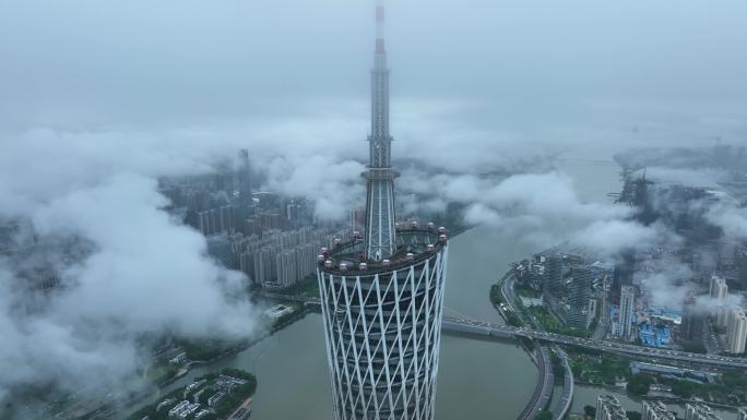 高空下近距离航拍云雾中的广州塔