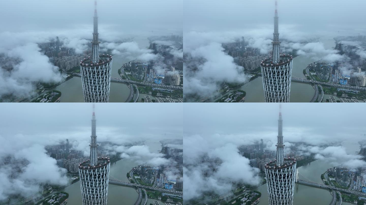 高空下近距离航拍云雾中的广州塔