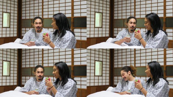 混血夫妇在日本床上喝酒