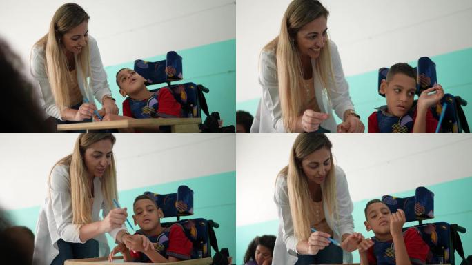 老师在教室里帮助一个残疾男孩