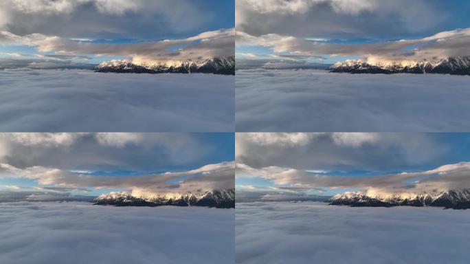 【4K正版】航拍日光下的云层雪山群