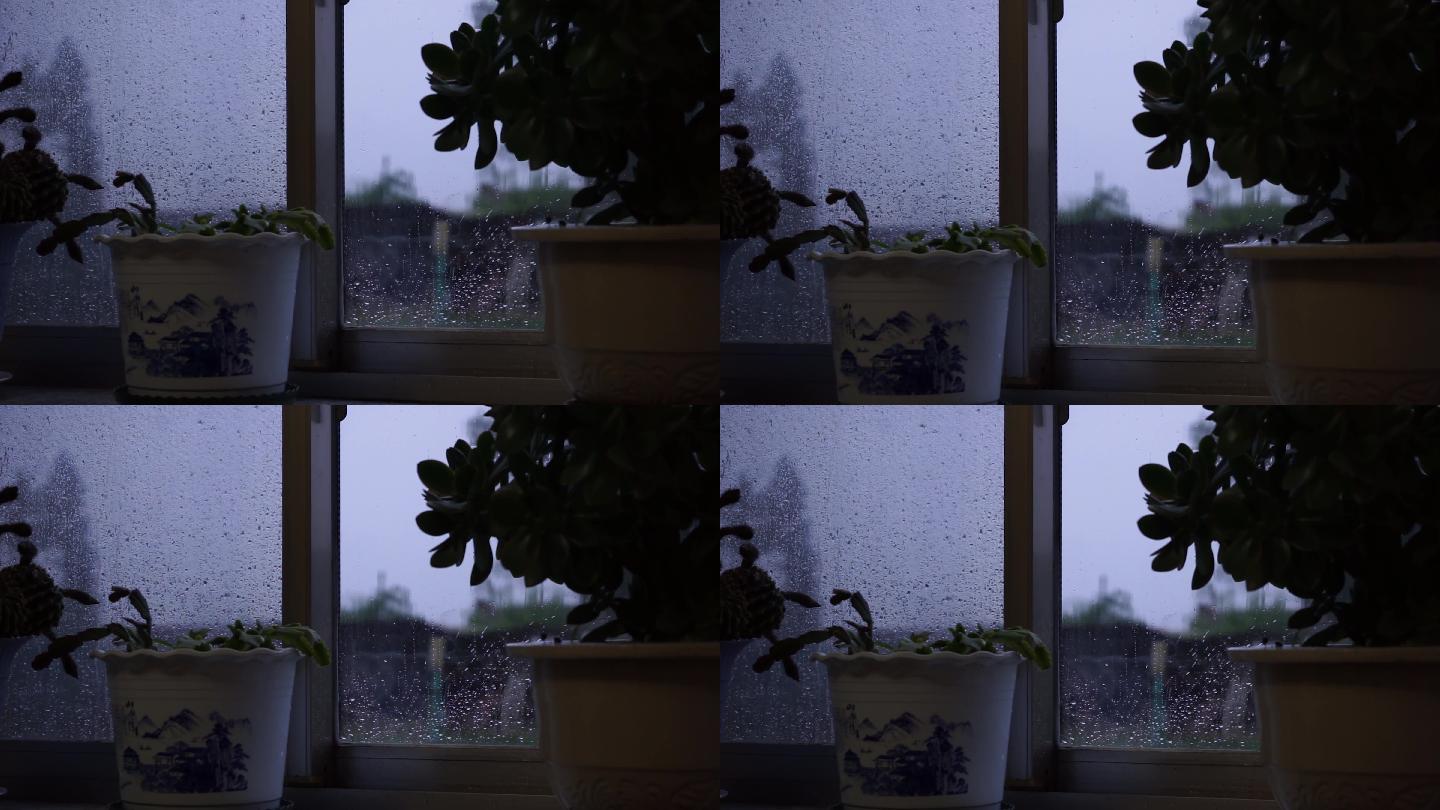 透过农村房子的窗户看外面下雨