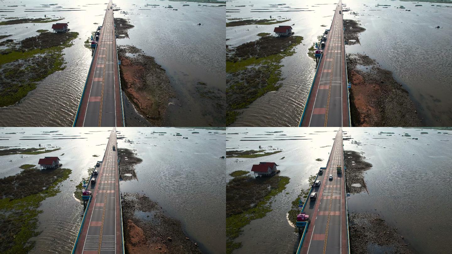泰国公路桥乡村公路上汽车行驶4K交通鸟瞰图