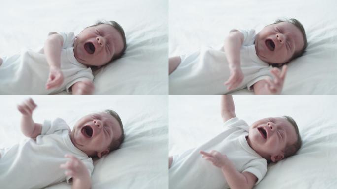 婴儿的哭泣是天堂的痛苦，但他们的微笑是天堂的欢乐