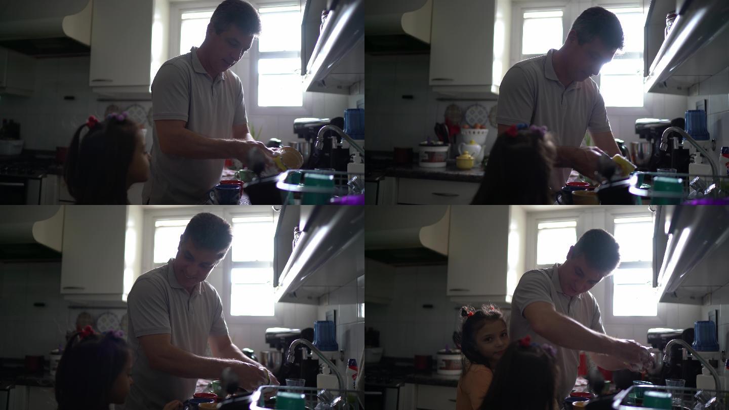 父亲在家洗碗，和女儿聊天