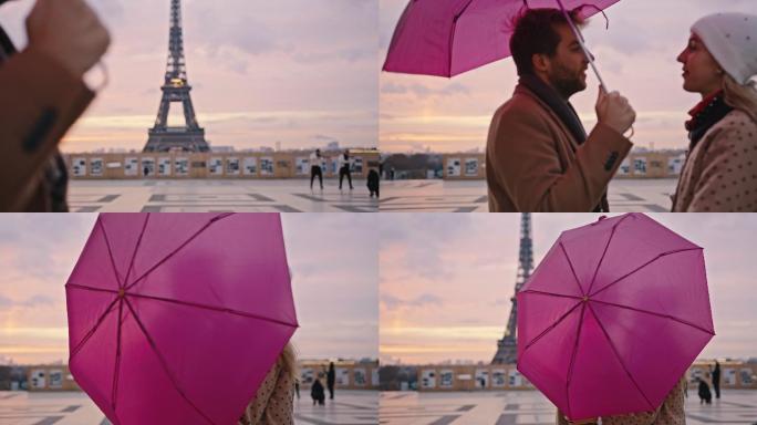 巴黎埃菲尔铁塔旁，斯洛莫恋人在雨伞后亲吻
