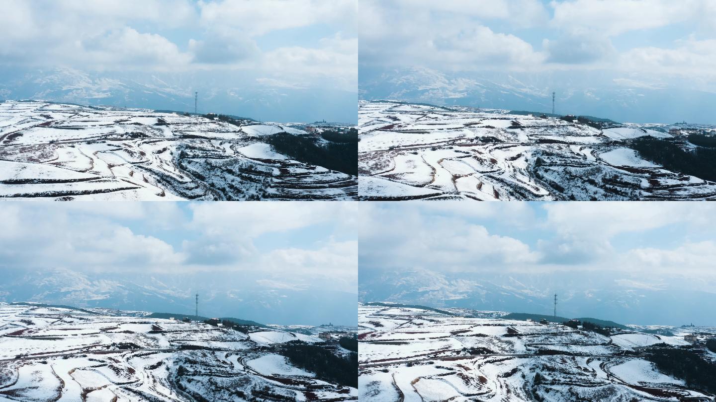 冬季白雪覆盖山川田野农村梯田公路