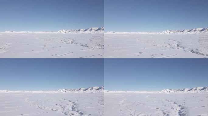 无人机POV拍摄美丽的科罗拉多沙漠冬季丘陵和山区的假山降雪极端天气视频系列