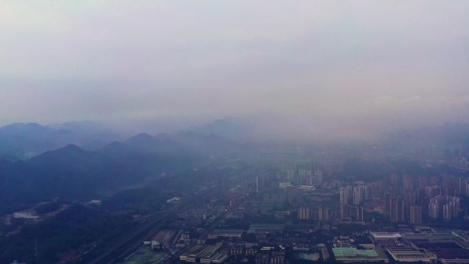 航拍城市高空浮云山脉连绵