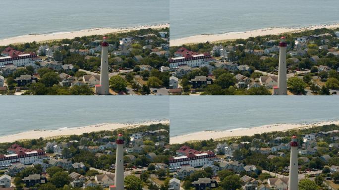 夏天阳光明媚的日子里，新泽西州五月角的灯塔。具有向前平移电影摄影机运动的空中全景视频。