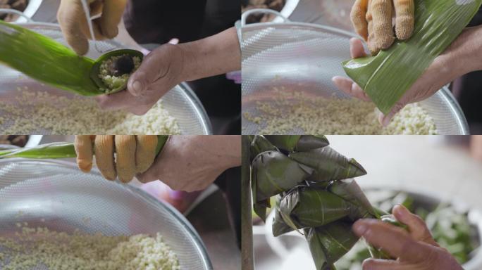 中国端午节手工包糯米粽子特写视频