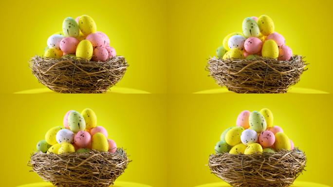 黄色背景巢中的复活节彩蛋