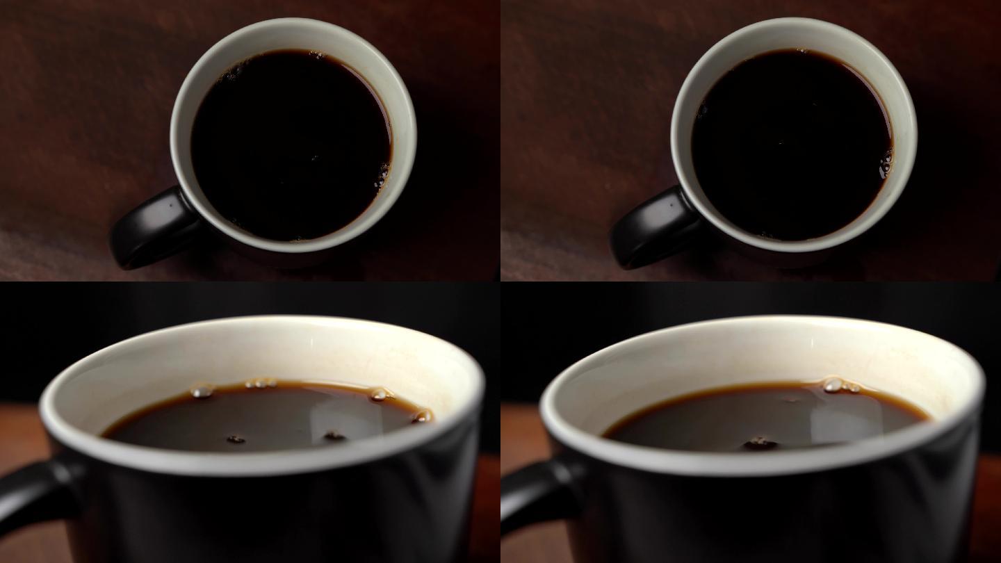 杯子里倒黑咖啡特写镜头