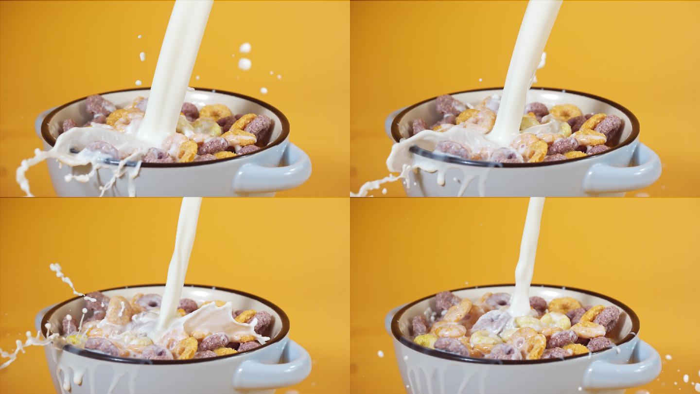 把牛奶倒在水果圈里，玉米片盛在碗里，超级慢动作