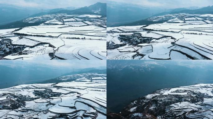 冬季白雪皑皑山川田野农村远处连绵雪山