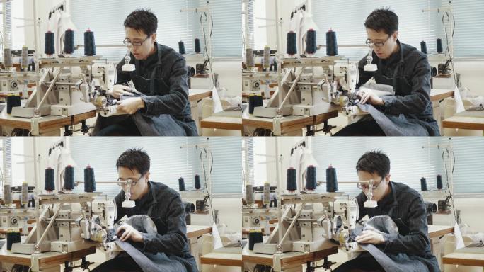 一位中年裁缝在设计工作室的缝纫机前工作的中镜头