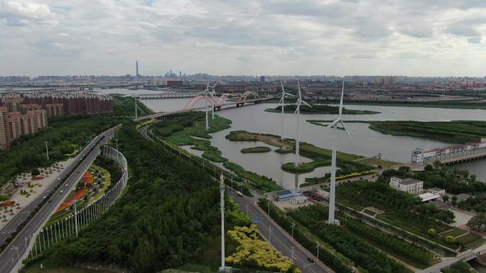 原创4K航拍天津滨海中新生态城彩虹桥风车