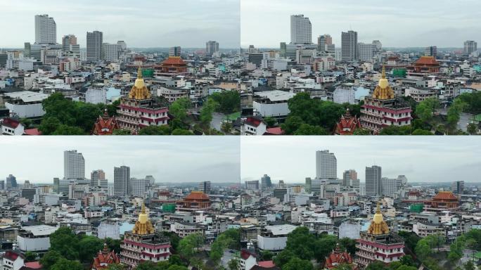 泰国宋克拉省哈代区寺庙中摩天大楼哈代城和大型金塔的空中无人机