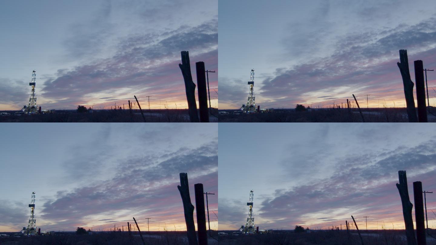 黎明或黄昏时分，在得克萨斯州西部或新墨西哥州东南部卡尔斯巴德附近的美国南部油田，手持水力压裂油气钻机